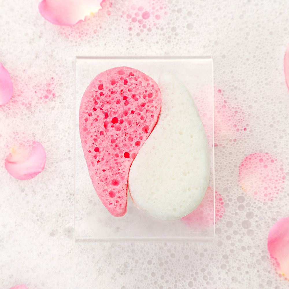 Angled front view with bag zipped and handles upright.