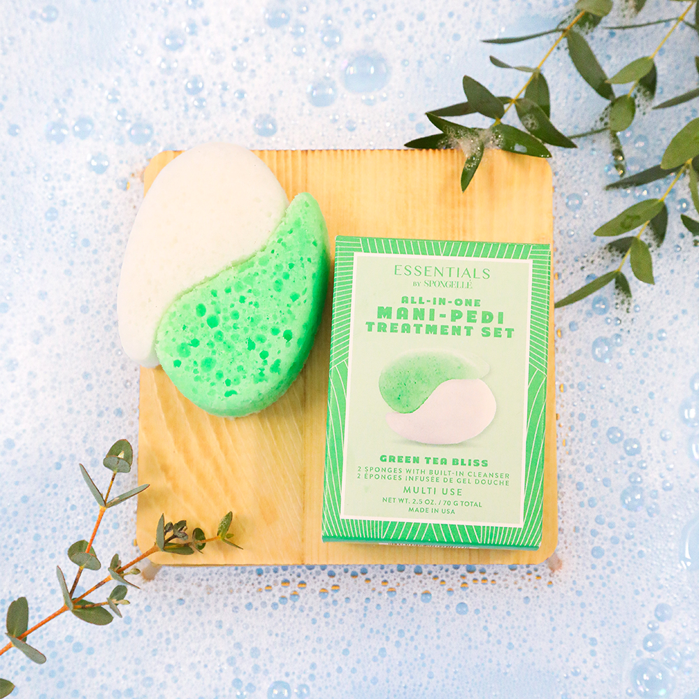 Angled front view with bag zipped and handles upright.