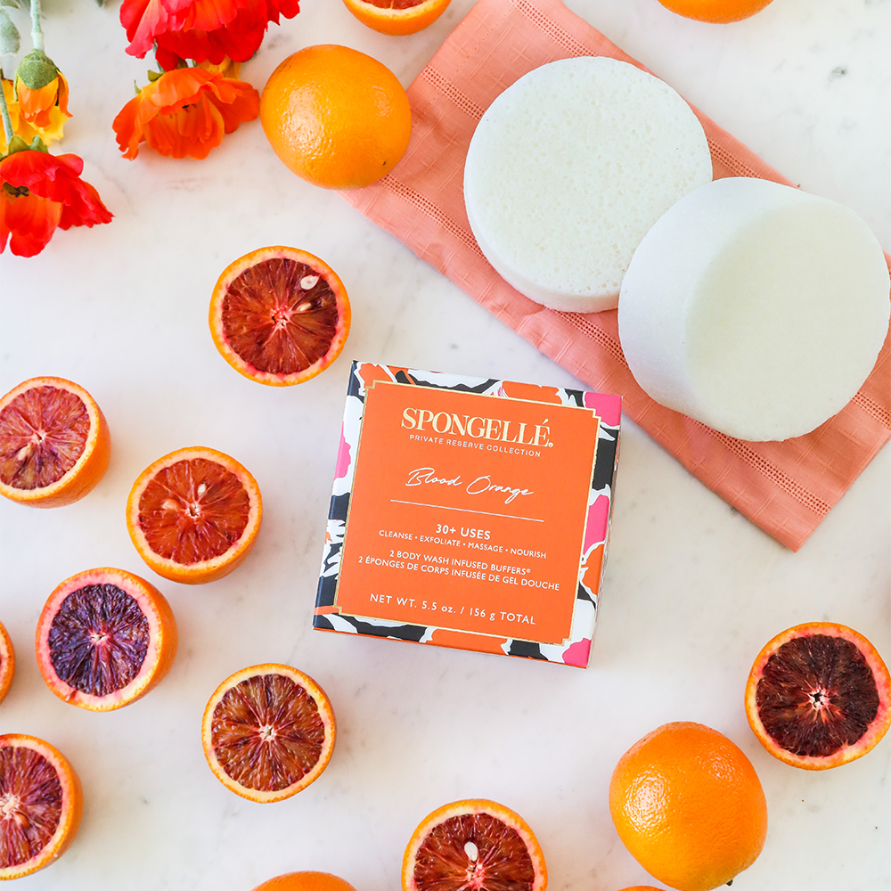 Angled front view with bag zipped and handles upright.